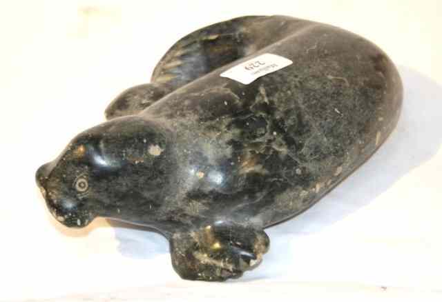 Appraisal: AN ESKIMO ART CARVED SOAPSTONE FIGURE of a walrus indistinctly