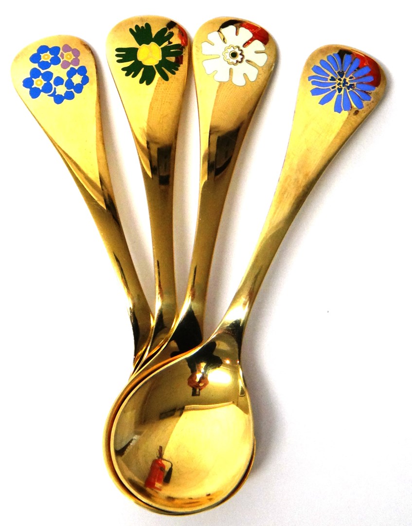 Appraisal: Four Georg Jensen Sterling silver gilt and enameled year spoons