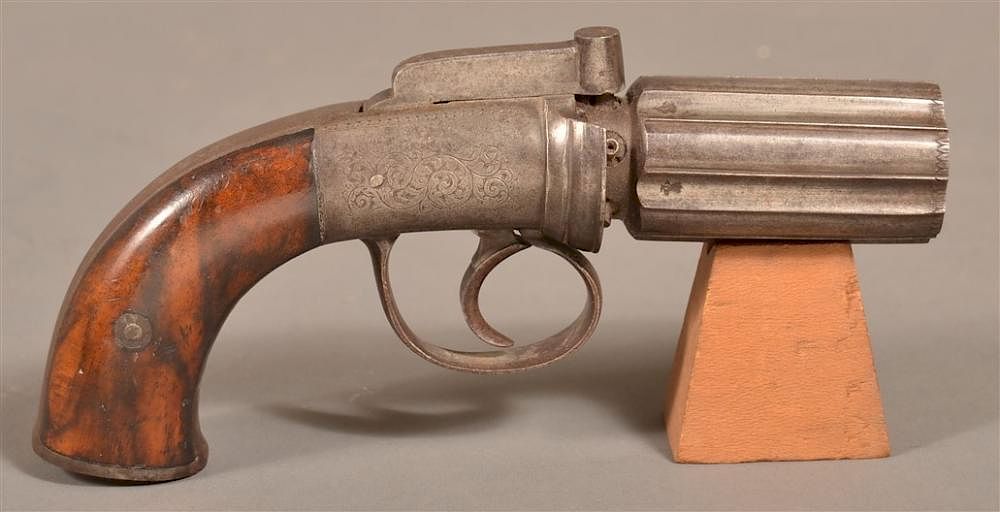 Appraisal: English Percussion Pepperbox Revolver English Percussion Pepperbox Revolver caliber fluted