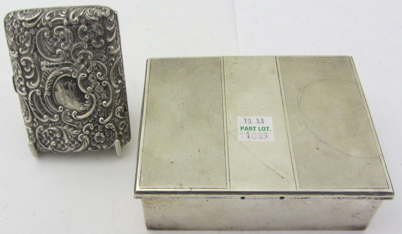 Appraisal: A Victorian silver rectangular cigarette case with scroll and floral