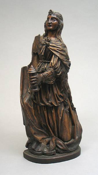 Appraisal: A Norther European Baroque carved walnut figure of Saint Barbara