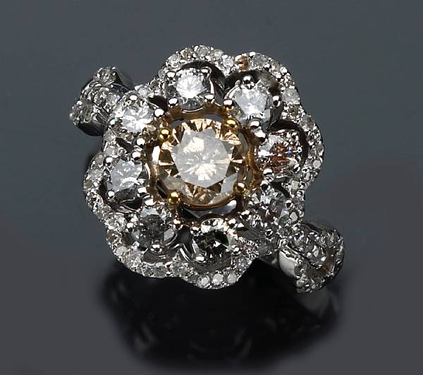 Appraisal: A colored diamond diamond and k white gold ring estimated