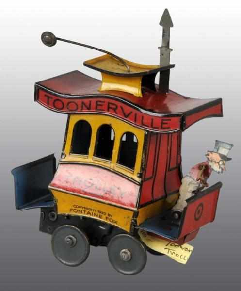 Appraisal: Tin Nifty Toonerville Trolley Wind-Up Toy Description German Working Marked