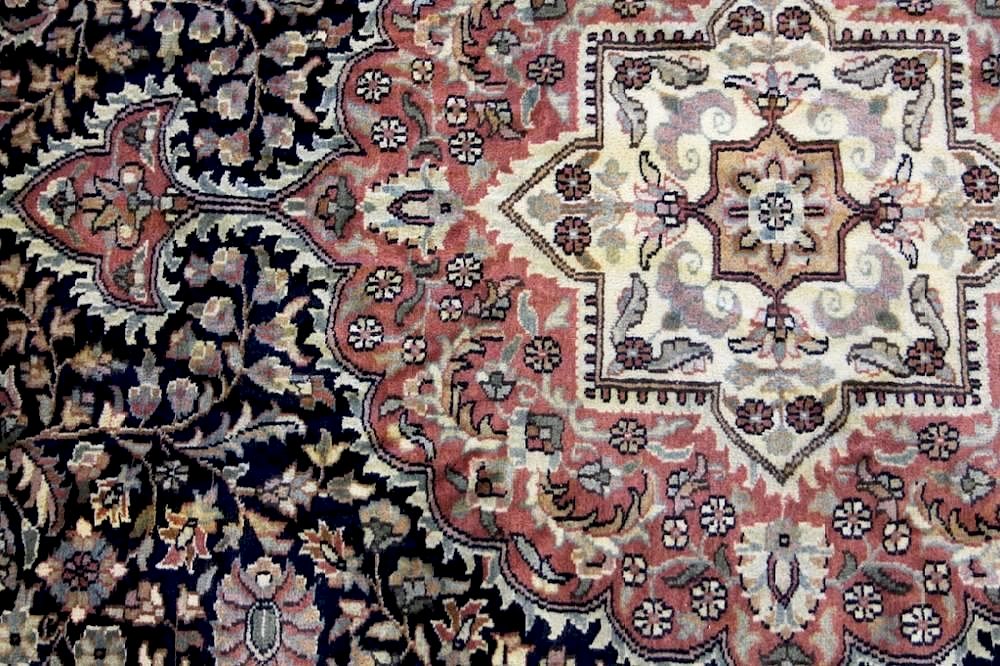 Appraisal: Black tabriz carpet A black Tabiz carpet nd half th