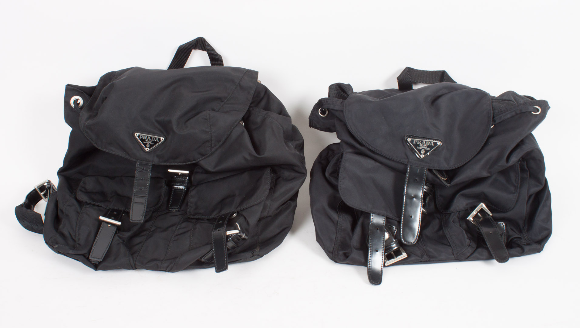 Appraisal: Prada black nylon back pack with authenticity certificate together with