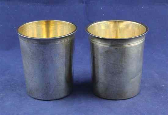 Appraisal: Two similar th century French standard plain silver beakers with