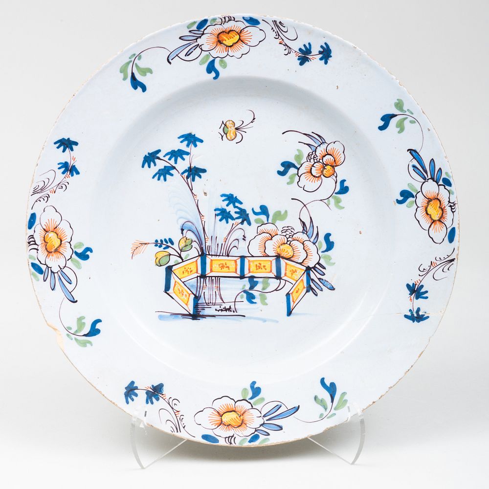 Appraisal: Delft Peony and Fence Charger in diam Condition Wear and