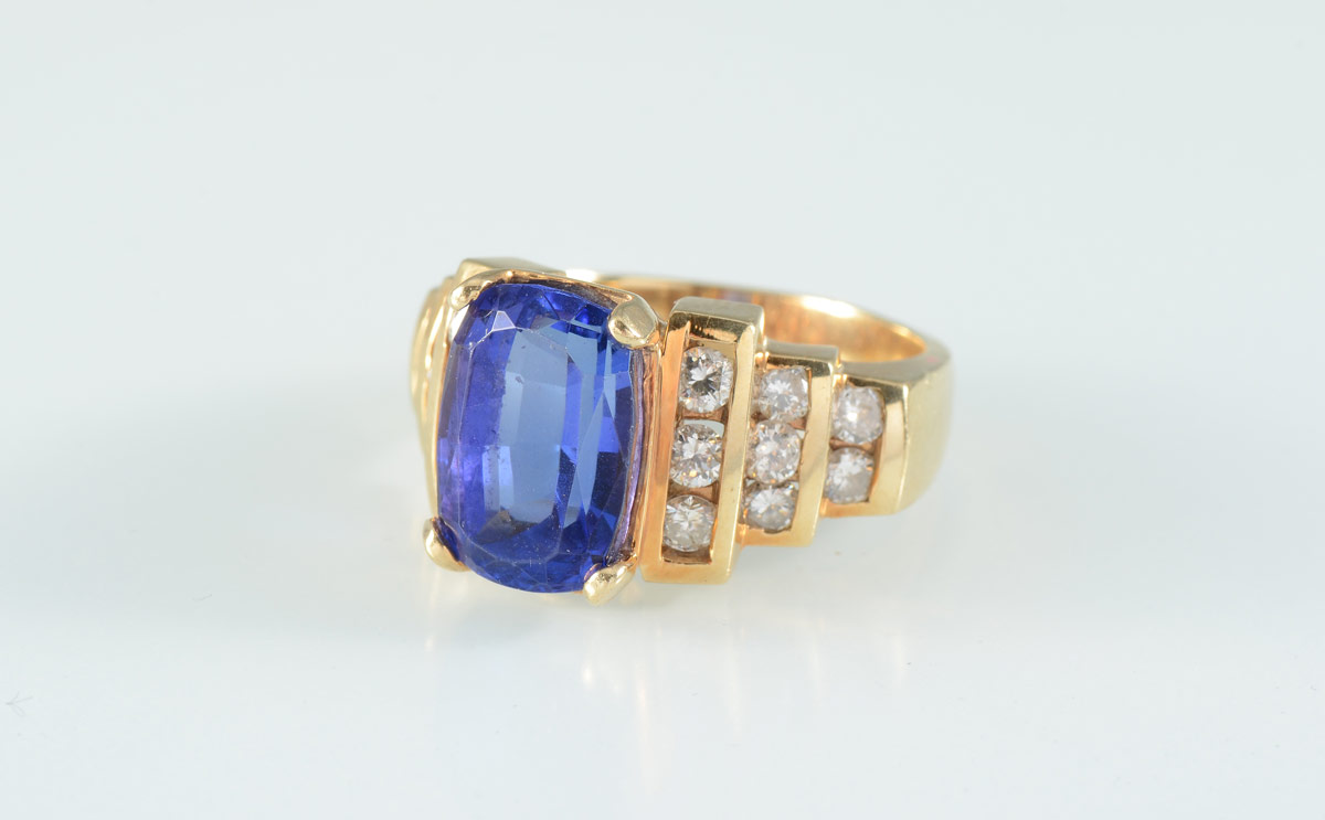 Appraisal: CT TANZANITE RING W CT DIAMONDS K yellow gold ring