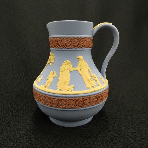 Appraisal: Wedgwood Jasperware Pitcher scarce triple color blue background maidens and