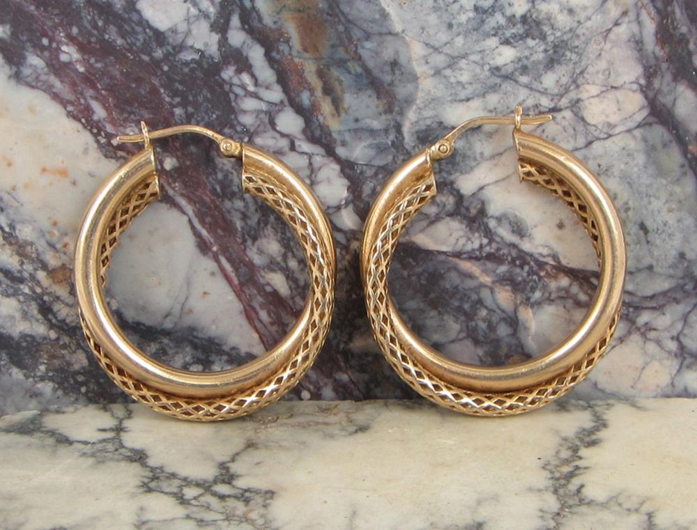 Appraisal: PAIR OF FOURTEEN KARAT GOLD HOOP EARRINGS each having two