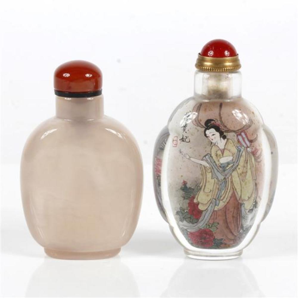 Appraisal: TWO CHINESE SNUFF BOTTLES ONE JADE WITH RED STONE STOPPER