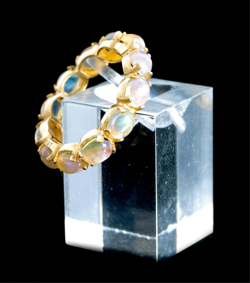 Appraisal: K YELLOW GOLD OPAL RING BAND SIZE k yellow gold