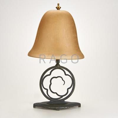 Appraisal: CRUCET Black enameled metal table lamp with amber glass shade