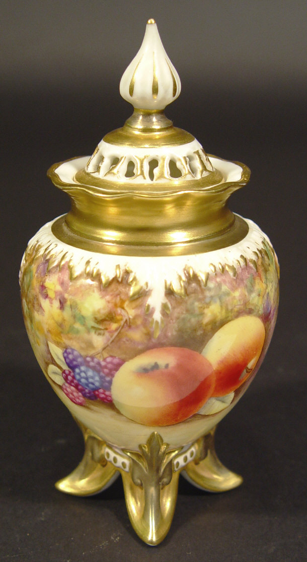 Appraisal: Royal Worcester four footed vase and pierced cover hand painted