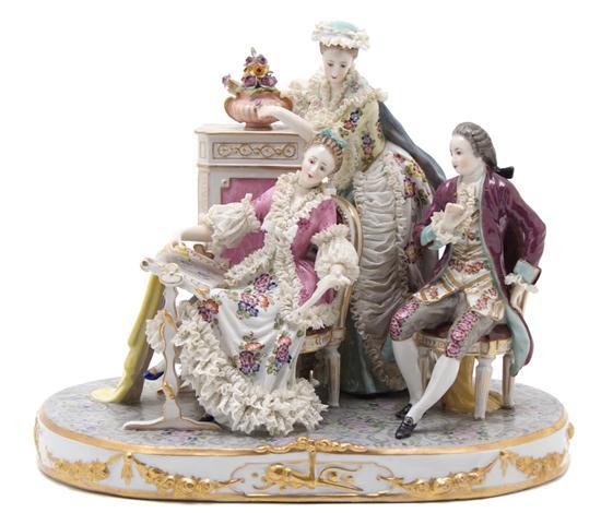 Appraisal: Continental Porcelain Figural Group depicting a parlor scene of a