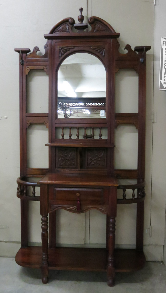 Appraisal: VICTORIAN STYLE MAHOGANY HALLSTAND the upper half centering a mirror