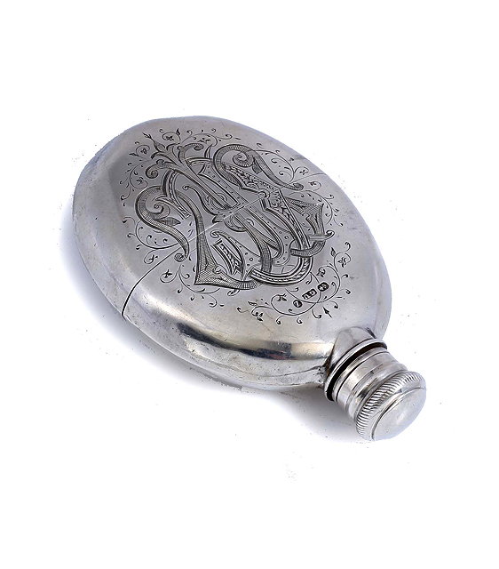 Appraisal: A VICTORIAN SILVER HIP FLASK with engraved monogram to each