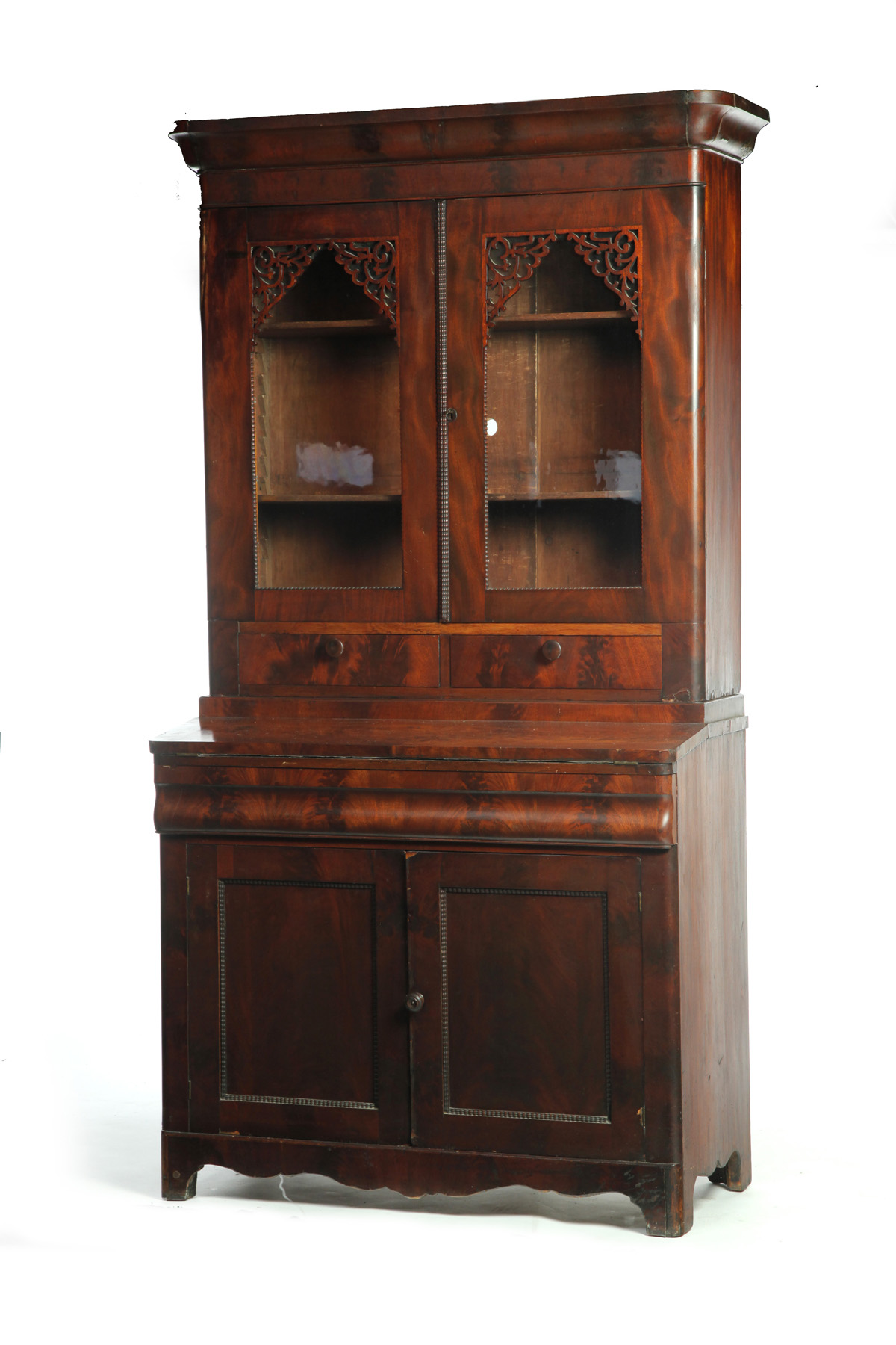 Appraisal: LATE EMPIRE SECRETARY BOOKCASE American mid th century mahogany veneer