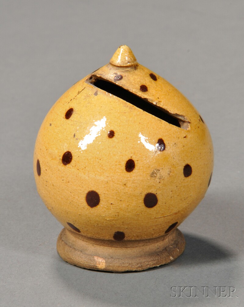 Appraisal: Polka-dot-glazed Pottery Bank America early th century globular form with