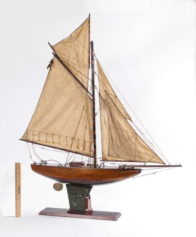 Appraisal: TH CENTURY GAFF RIGGED POND BOAT ON STAND Shaped and