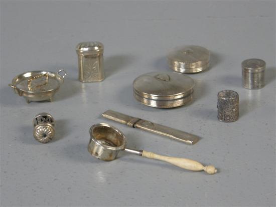 Appraisal: Dutch silver items comprising two tape measure holders a needlecase