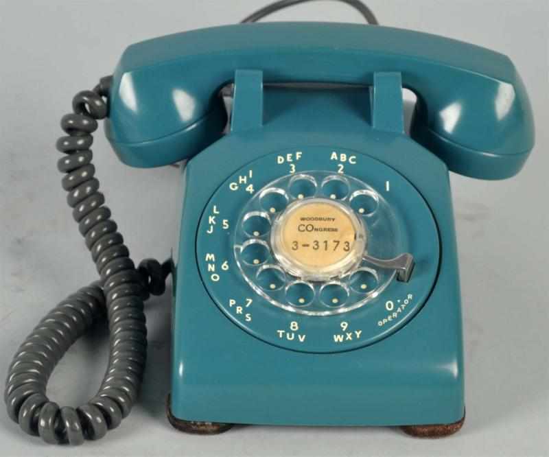 Appraisal: Western Electric Dark Blue Cradle Phone Soft plastic shell and