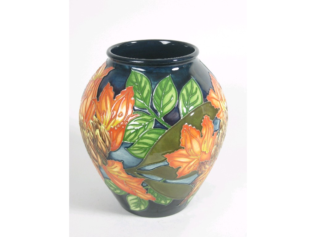 Appraisal: A Moorcroft Vase decorated Flame of the Forest design in