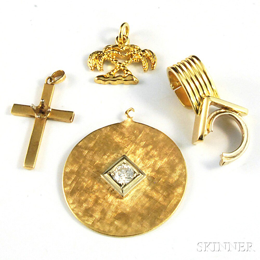 Appraisal: Four Gold Charms and Elements a brushed kt gold and