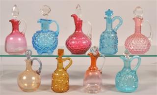 Appraisal: Various Victorian Art Glass and Pattern Glass Cruets Tallest measures