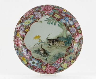 Appraisal: A Chinese famille rose saucer dish decorated with kittens chasing