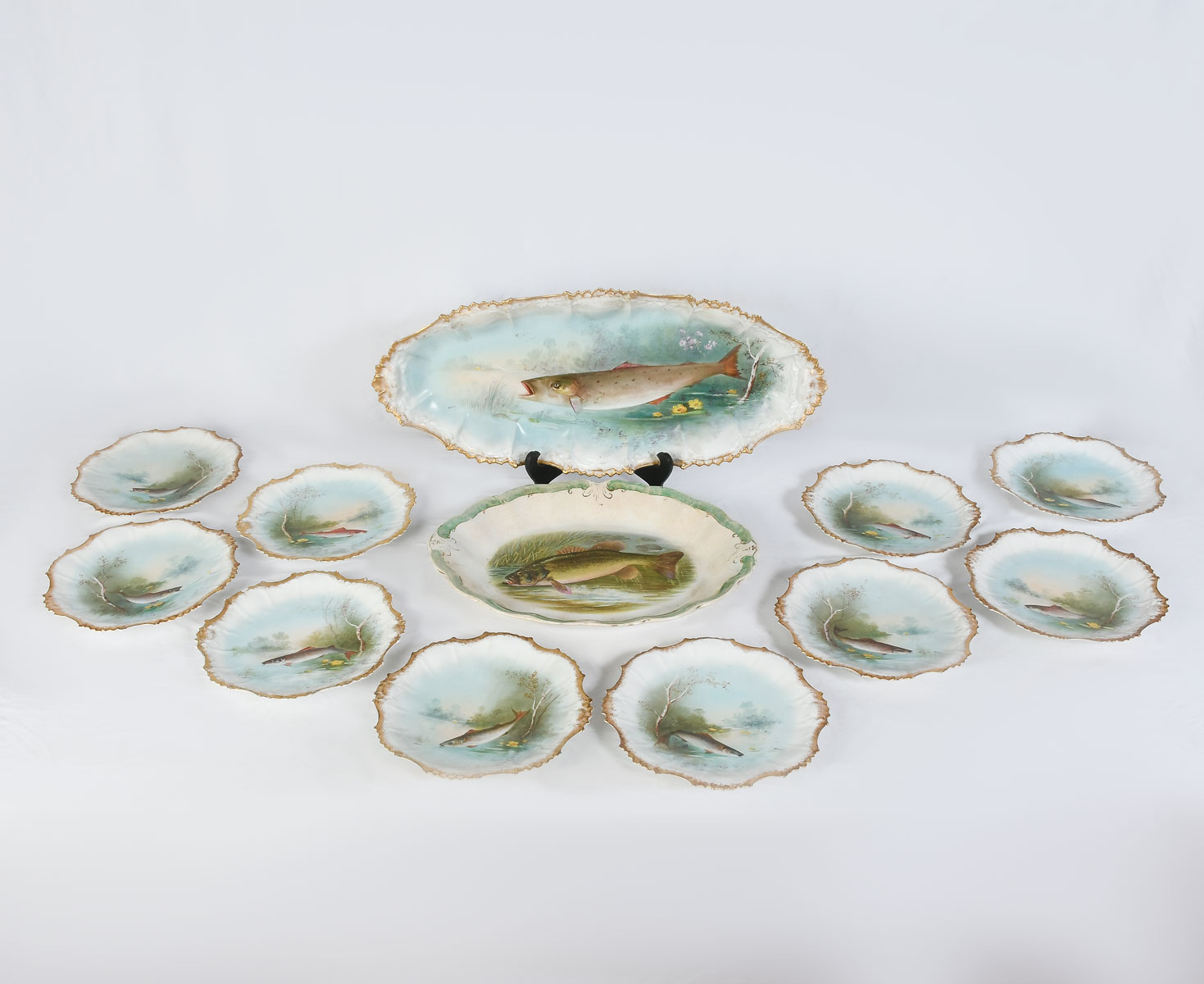 Appraisal: PC LIMOGES CORONET PORCELAIN FISH SET Comprising - Large fish