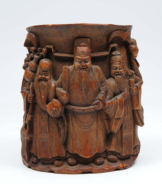 Appraisal: A CHINESE CARVED BAMBOO BRUSH POT decorated with bats and