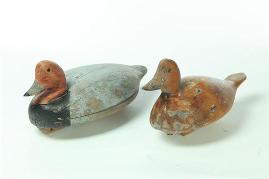 Appraisal: TWO DECOYS American st half- th century carved wood Redhead