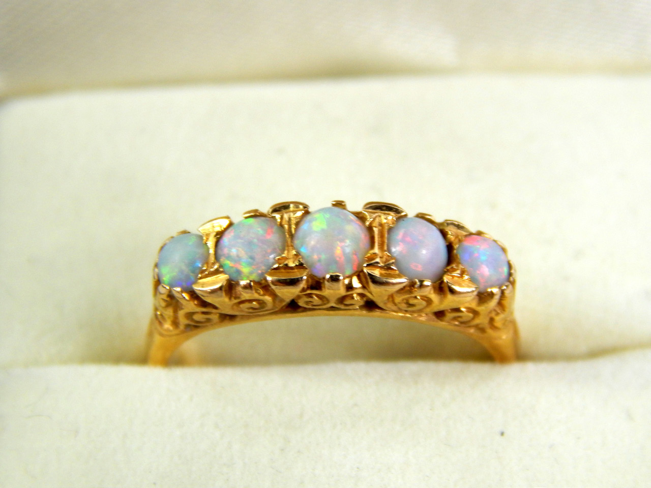 Appraisal: An opal five stone dress ring set in yellow metal