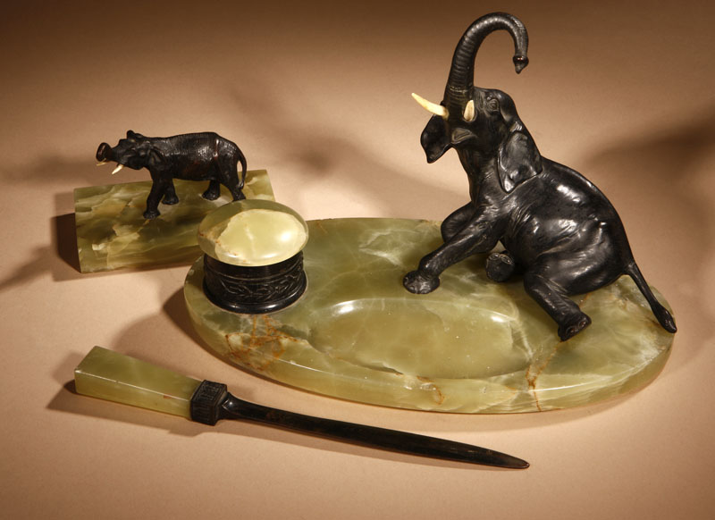 Appraisal: A Continental patinated bronze and green onyx three-piece part elephantine