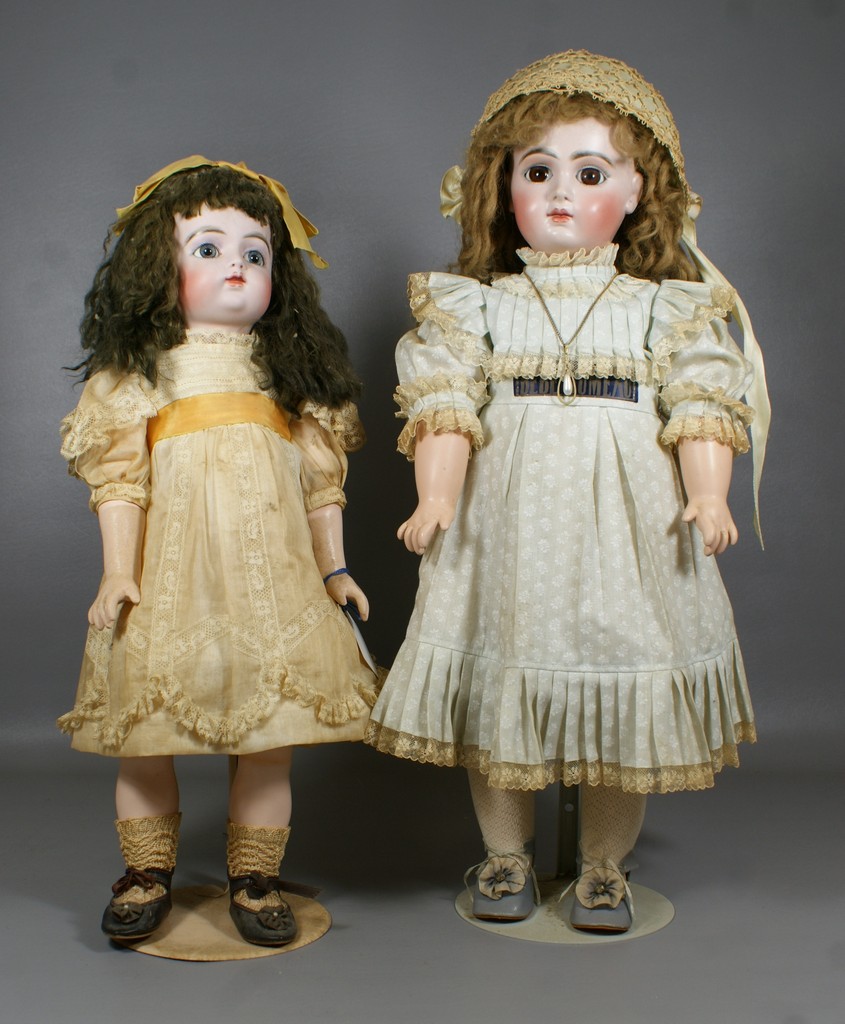 Appraisal: Reproduction French Bisque Dolls larger is a copy of an