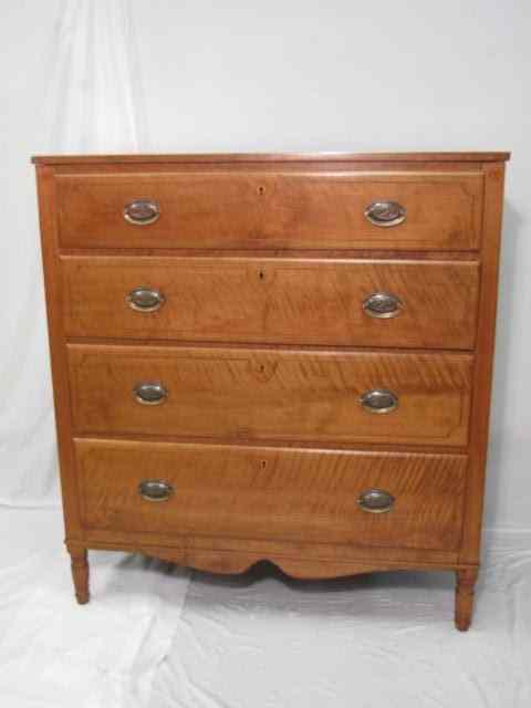 Appraisal: A Sheraton walnut chest of drawers having a rectangular top