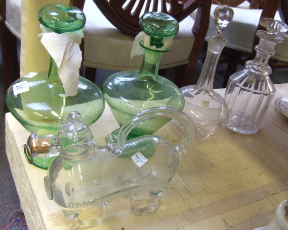 Appraisal: A Victorian glass gin pig two green glass decanters and