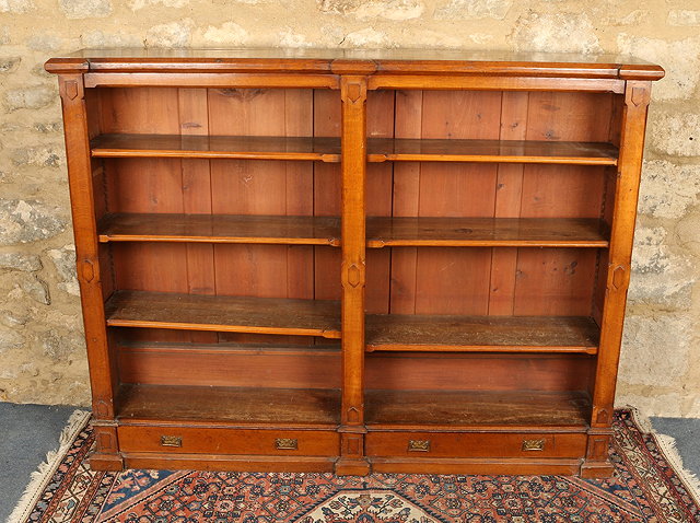 Appraisal: AN ARTS CRAFTS OAK OPEN FRONT BOOKCASE fitted adjustable shelves