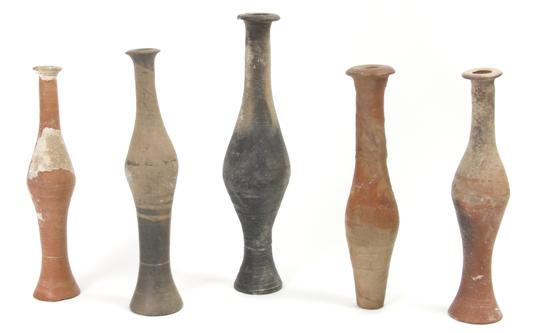 Appraisal: A Collection of Five Near East Earthenware Unguentariums Height of