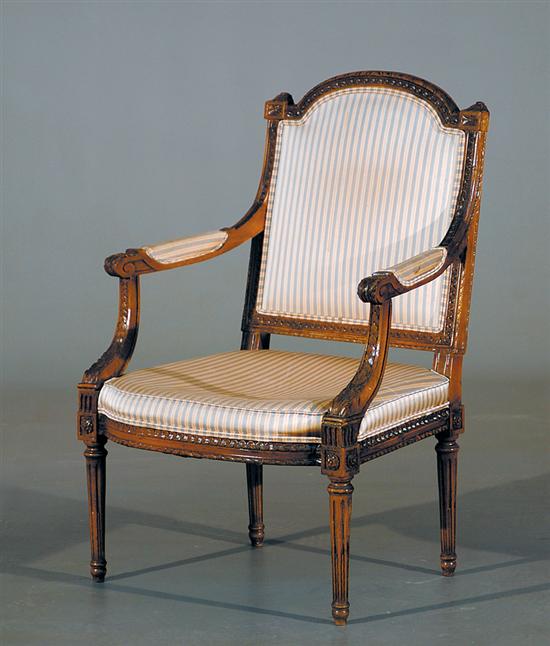 Appraisal: Louis XVI style fruitwood fauteuil early th century carved and