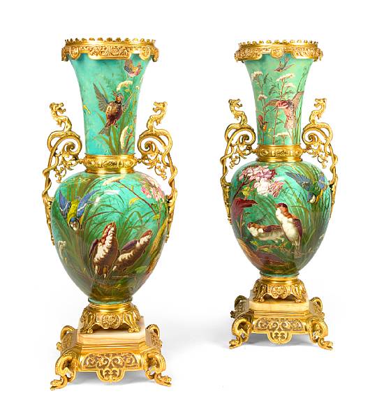 Appraisal: A pair of French gilt bronze mounted earthenware vases late