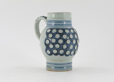 Appraisal: A Japanese porcelain mug in the manner of German stoneware