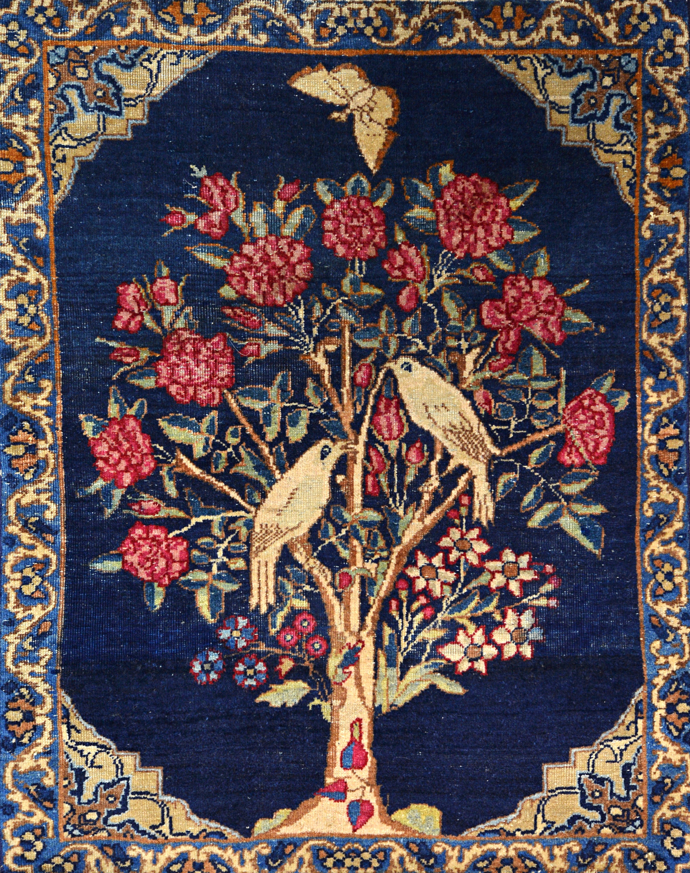 Appraisal: A Kerman mat Persian the indigo field with a flowering