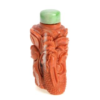 Appraisal: Chinese carved coral snuff bottle Chinese carved coral snuff bottle