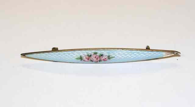 Appraisal: A SILVER AND ENAMEL BAR BROOCH decorated with roses by