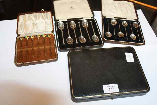 Appraisal: TWO SETS OF SIX SILVER COFFEE SPOONS cased a set