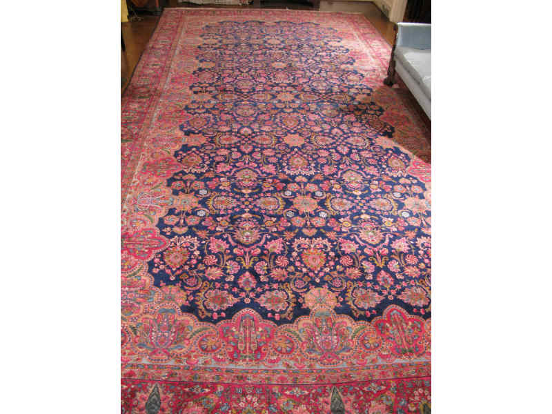 Appraisal: Persian Large Room Size Rug Kerman ca s dark blue