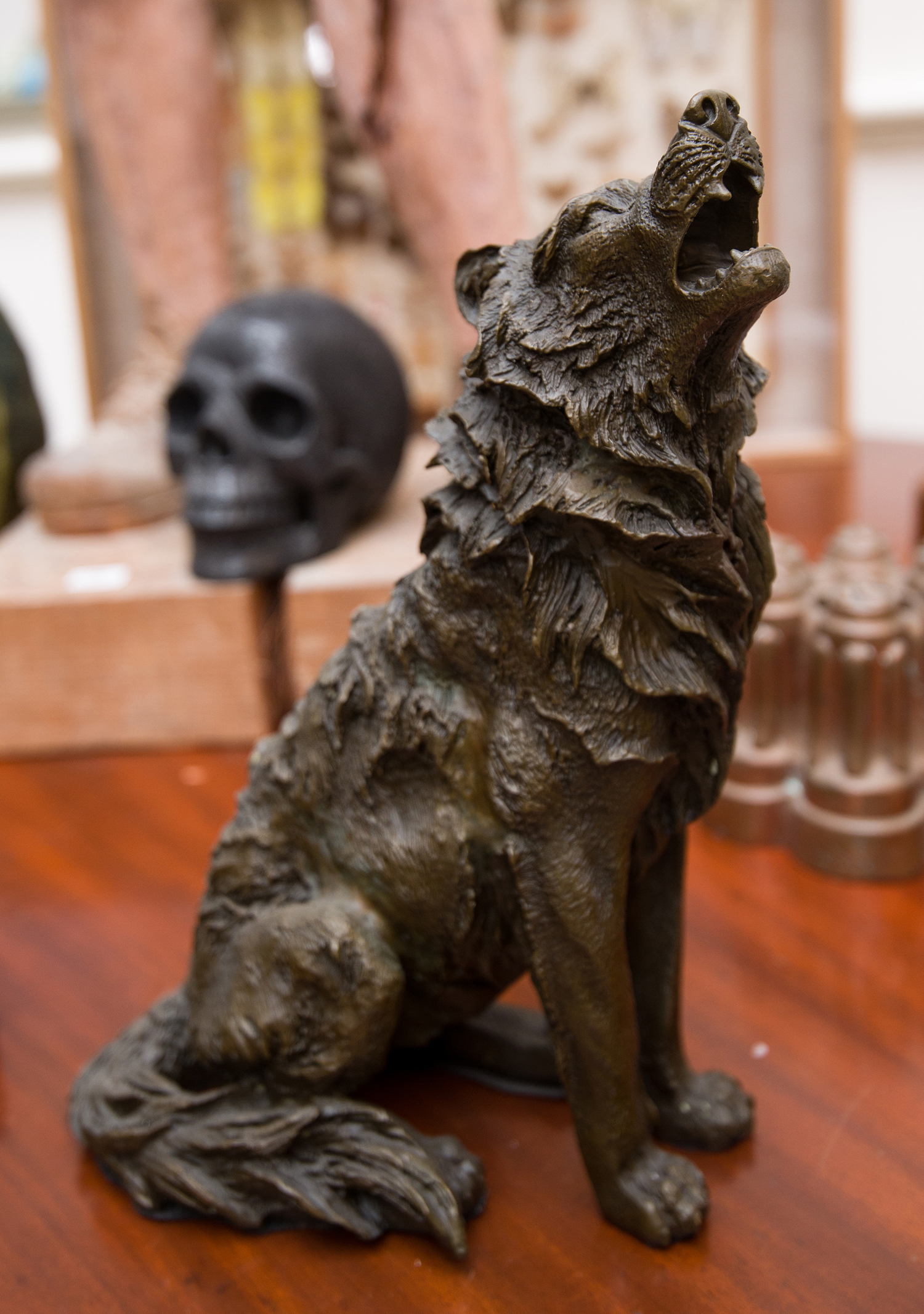 Appraisal: A BRONZE HOWLING WOLF h x w x d