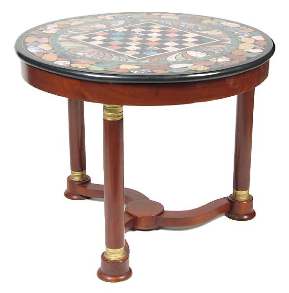 Appraisal: An Empire style brass inlaid specimen marble top table height